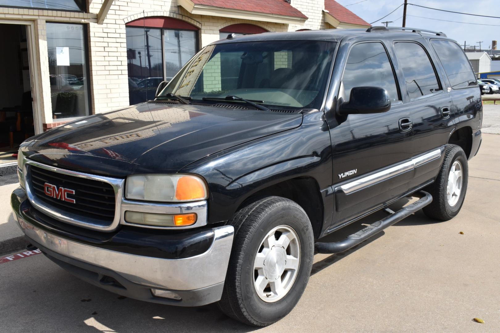 2004 Black /Tan GMC Yukon (1GKEK13Z64R) , located at 5925 E. BELKNAP ST., HALTOM CITY, TX, 76117, (817) 834-4222, 32.803799, -97.259003 - Buying a 2004 GMC Yukon 4WD can offer several benefits, including: Versatility: The GMC Yukon is known for its versatility, offering ample passenger seating and cargo space. The 4WD capability enhances its ability to handle various road conditions, making it suitable for both urban and off-road dri - Photo#1